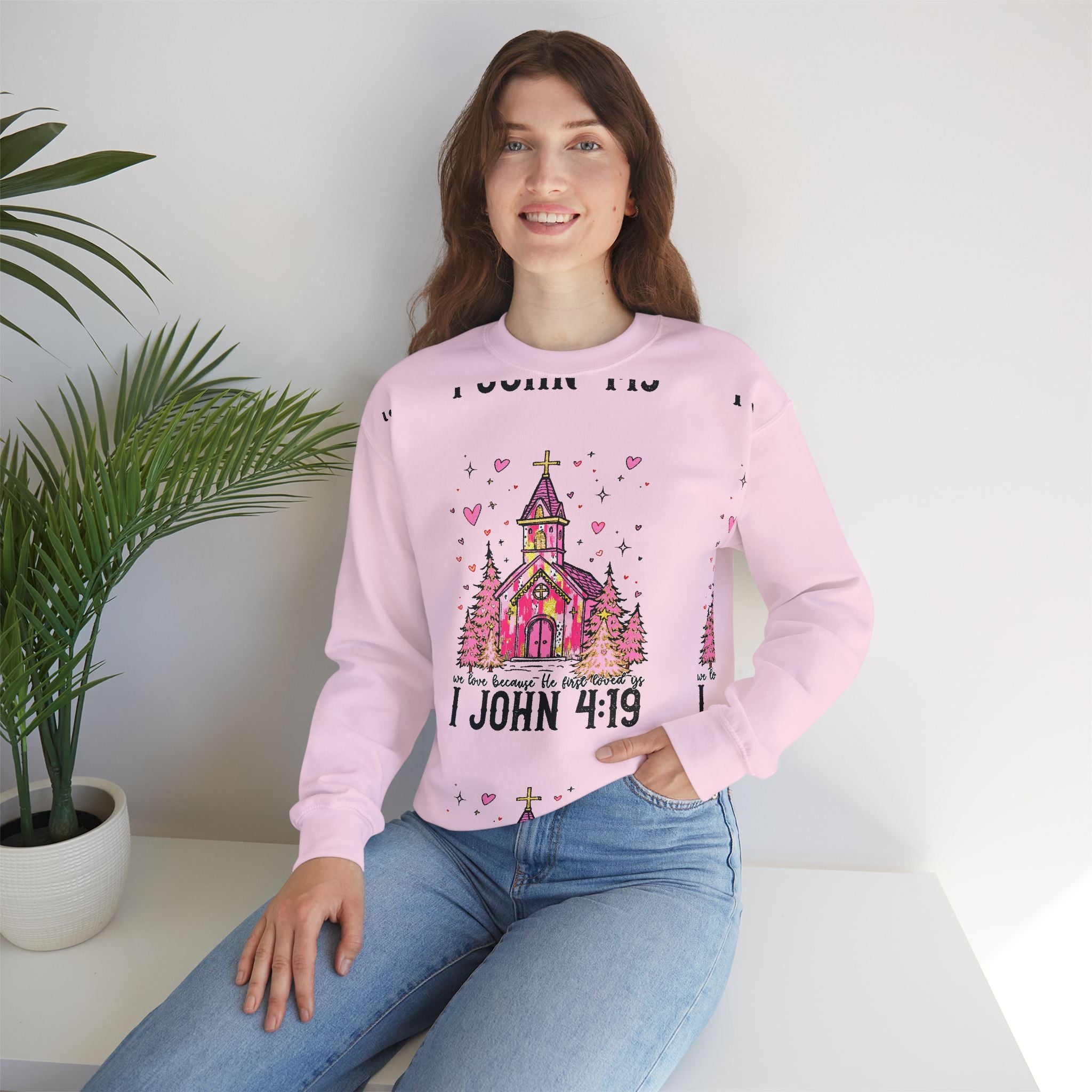 Christian Sweatshirt — Pink Church Illustration with “I John 4:19” Scripture